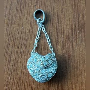 Diamond-crusted sterling silver heart pendant